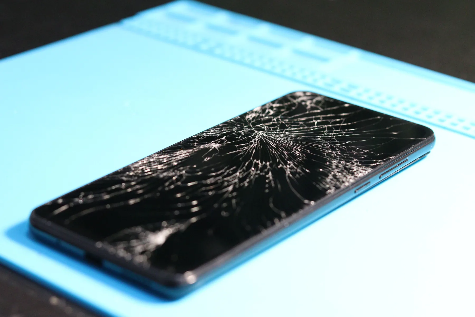 Cracked smartphone ready for repair