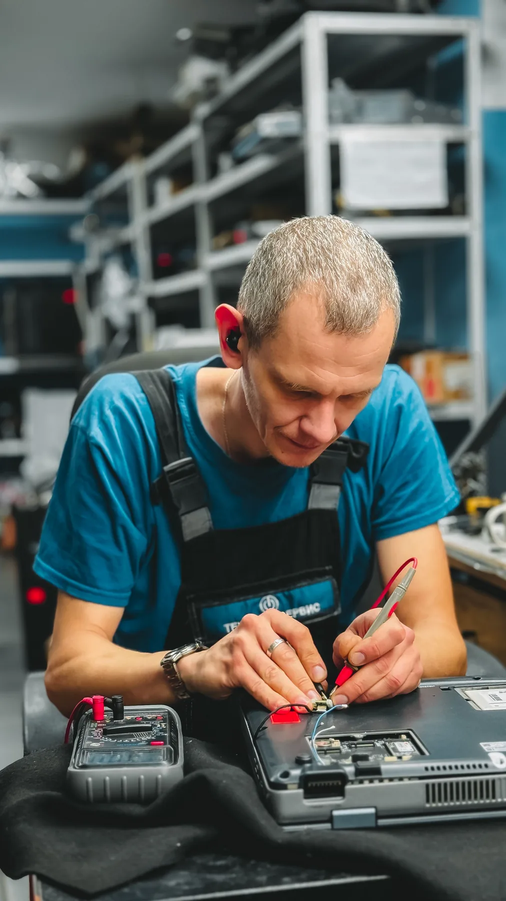 Technician working on an electronic device